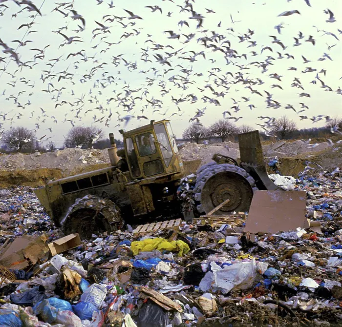 Framed Print : Landfill Compactor in a garbage dump France Framed Print : Landfill Compactor in a garbage dump France