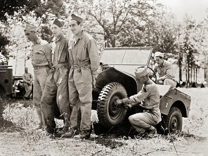 Framed Print : Lifting a Jeep Framed Print : Lifting a Jeep