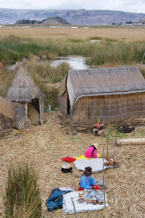 Framed Print : Local residents of floating reed islands of Uros, Lake Titicaca, Peru Framed Print : Local residents of floating reed islands of Uros, Lake Titicaca, Peru