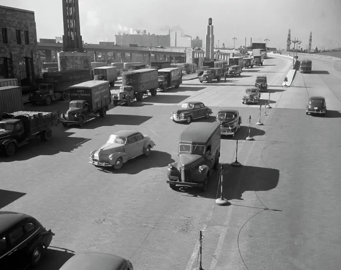 Framed Print : Lorries queuing near industrial building, high angle view