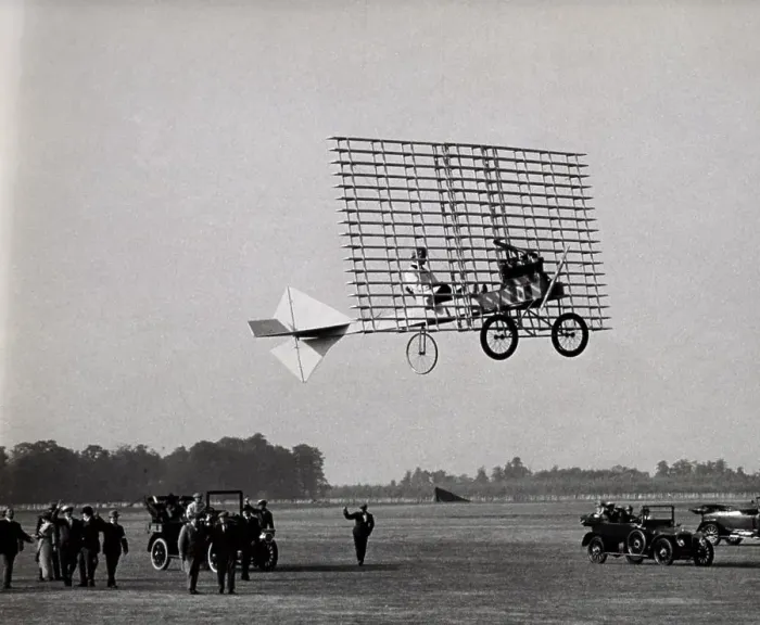 Framed Print : Low angle view of an aircraft flying over the ground