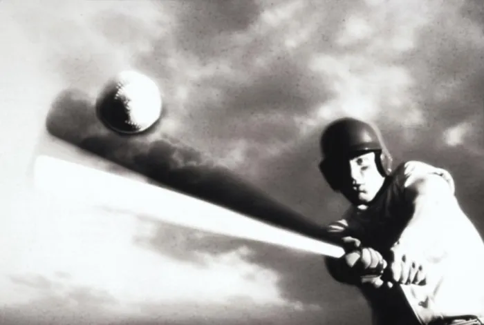 Framed Print : Low angle view of a baseball player swinging a baseball bat