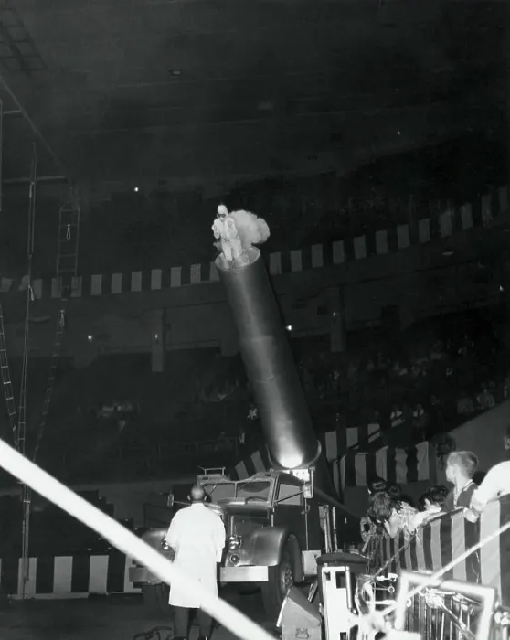 Framed Print : Low angle view of a human cannonball at the circus