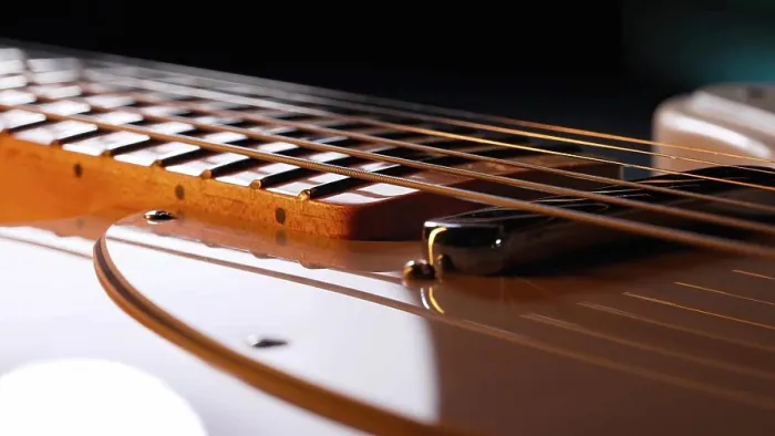 Framed Print : Macro of strings on electric guitar fretboard. Details of instrument close-up Framed Print : Macro of strings on electric guitar fretboard. Details of instrument close-up