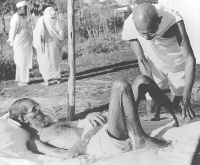 Framed Print : Mahatma Gandhi giving massage to a leper patient at Sevagram Ashram