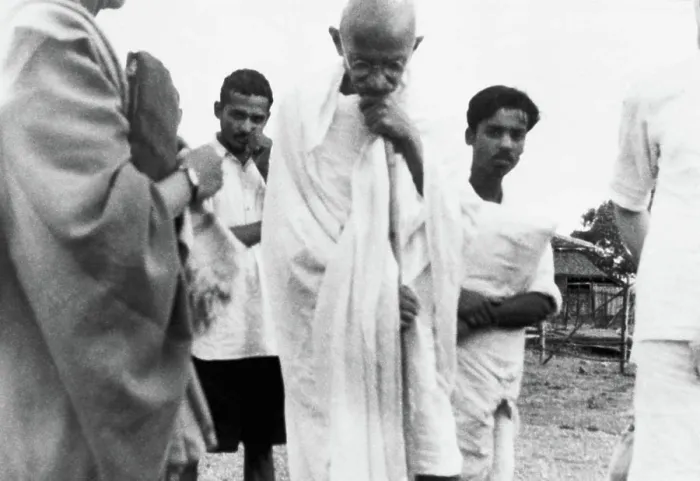 Framed Print : Mahatma Gandhi walking with Dhirendra Chatterjee brother of Abha Gandhi and others at Sevagram Ashram