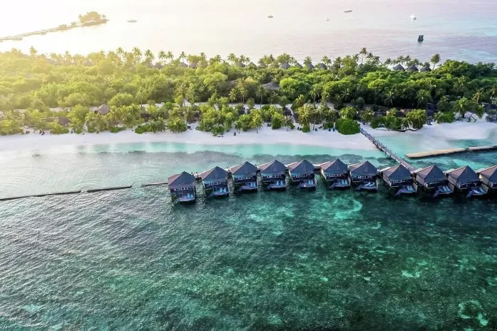 Framed Print : Maldives, Lhaviyani Atoll, Kuredu, Aerial view of coastal beach and row of resort bungalows Framed Print : Maldives, Lhaviyani Atoll, Kuredu, Aerial view of coastal beach and row of resort bungalows