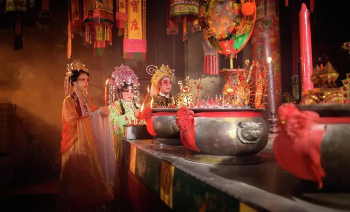Framed Print : Male and female Chinese opera actors Light a candle to pray homage to the gods to enhance the prosperity for yourself Framed Print : Male and female Chinese opera actors Light a candle to pray homage to the gods to enhance the prosperity for yourself