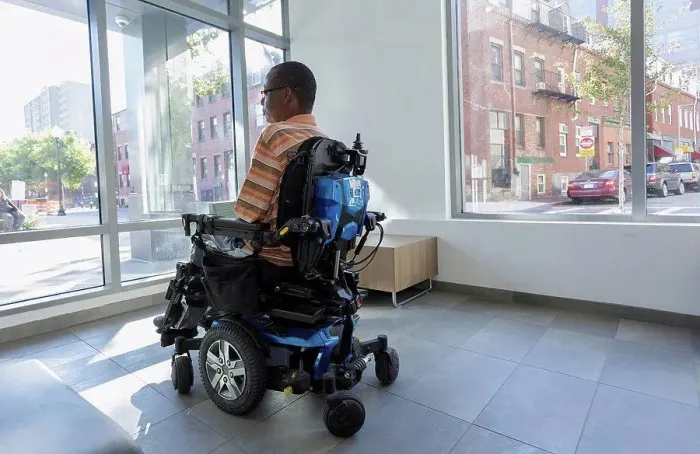 Framed Print : Man with Guillain-Barre Syndrome on wheelchair looking out through the apartment window Framed Print : Man with Guillain-Barre Syndrome on wheelchair looking out through the apartment window