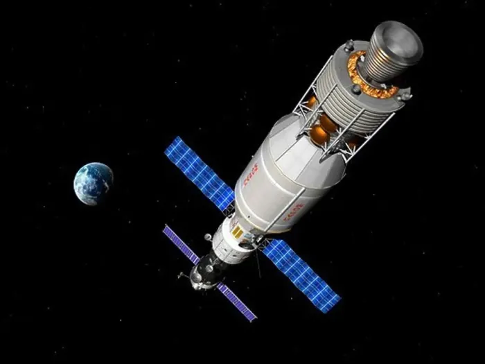 Framed Print : A manned Soyuz TMA-M spacecraft docked with an extended stay module Framed Print : A manned Soyuz TMA-M spacecraft docked with an extended stay module