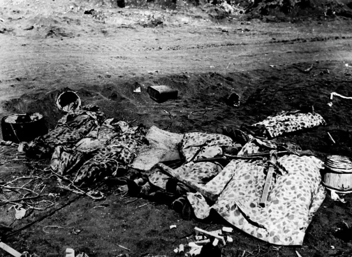 Framed Print : Marine Dead On Iwo Jima -- Wrapped in their camouflaged ponchos on the volcanic sands of Iwo Jima Framed Print : Marine Dead On Iwo Jima -- Wrapped in their camouflaged ponchos on the volcanic sands of Iwo Jima