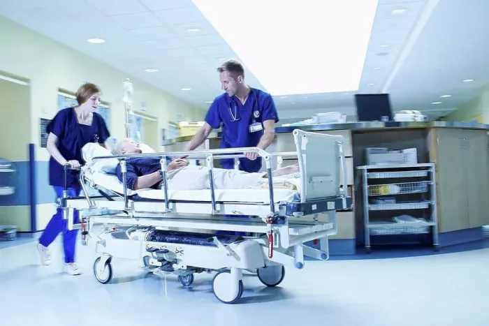 Framed Print : Two medics rushing with gurney in hospital emergency room Framed Print : Two medics rushing with gurney in hospital emergency room
