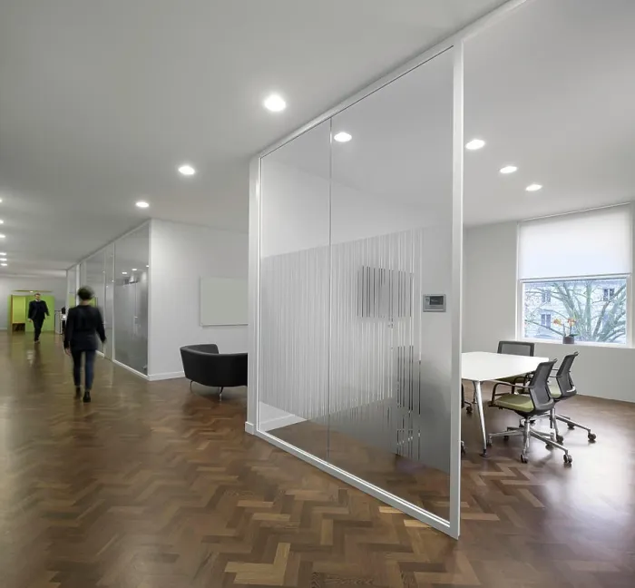 Framed Print : Meeting rooms enclosed behind a glass wall. AxiCom Office, London, United Kingdom. Architect: MZC+, 2019 Framed Print : Meeting rooms enclosed behind a glass wall. AxiCom Office, London, United Kingdom. Architect: MZC+, 2019
