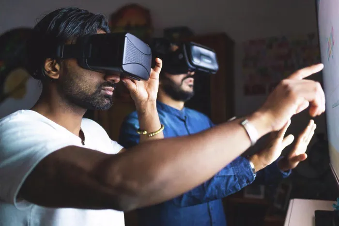 Framed Print : Men using virtual reality headsets Framed Print : Men using virtual reality headsets