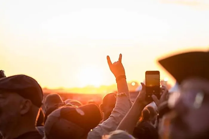 Framed Print : Metal greeting in front of the setting sun at the Wacken Open Air in Wacken Framed Print : Metal greeting in front of the setting sun at the Wacken Open Air in Wacken