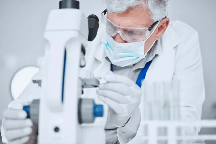 Framed Print : Microscope, science and study with old man in laboratory for pharmacy