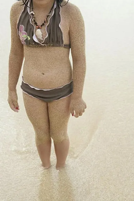 Framed Print : Midsection of a girl in bikini Framed Print : Midsection of a girl in bikini