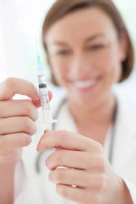 Framed Print : MODEL RELEASED. Doctor preparing injection Framed Print : MODEL RELEASED. Doctor preparing injection