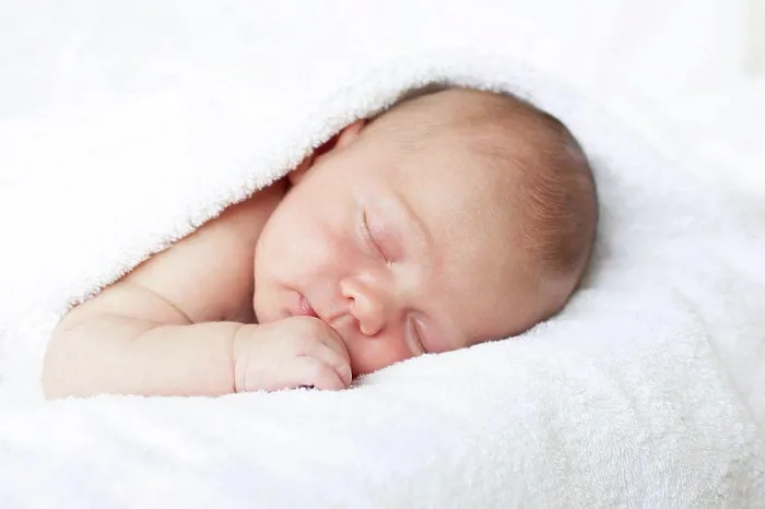 Framed Print : MODEL RELEASED. Newborn baby boy asleep Framed Print : MODEL RELEASED. Newborn baby boy asleep
