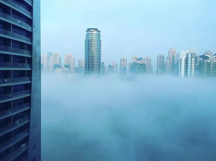 Framed Print : Modern skyscrapers of Dubai Marina in blue fog, climate change Framed Print : Modern skyscrapers of Dubai Marina in blue fog, climate change