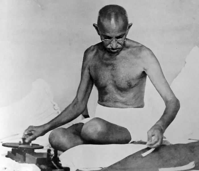 Framed Print : Mohandas Karamchand Gandhi spins cloth using traditional methods; Bombay 1945 Framed Print : Mohandas Karamchand Gandhi spins cloth using traditional methods; Bombay 1945