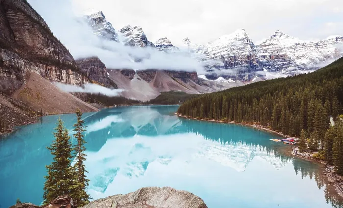 Framed Print : Moraine lake Beautiful turquoise waters of the Moraine lake with snow-covered peaks above it in Banff National Park of Framed Print : Moraine lake Beautiful turquoise waters of the Moraine lake with snow-covered peaks above it in Banff National Park of