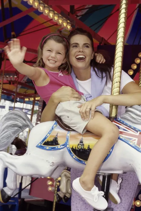 Framed Print : Mother and her daughter on a carousel Framed Print : Mother and her daughter on a carousel