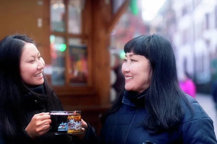 Framed Print : Mother and daughter drinking at Christmas market, Freiburg, Baden-Wurttemberg, Germany Framed Print : Mother and daughter drinking at Christmas market, Freiburg, Baden-Wurttemberg, Germany