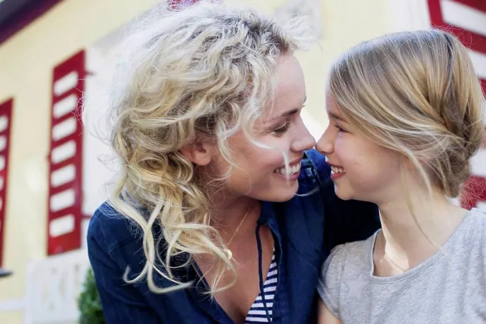 Framed Print : Mother and daughter enjoying being together outdoors Framed Print : Mother and daughter enjoying being together outdoors
