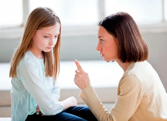 Framed Print : Mother scolding her 9 years old daughter Framed Print : Mother scolding her 9 years old daughter