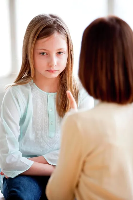 Framed Print : Mother scolding her 9 years old daughter