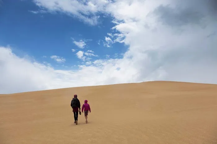 Framed Print : Mother and son walking along remote sand dunes, Wilsons Promontory, Victoria, Australia Framed Print : Mother and son walking along remote sand dunes, Wilsons Promontory, Victoria, Australia