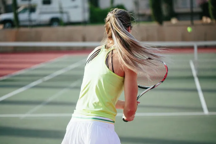 Framed Print : Motion shot of blonde athlete with long pony tail being active d Framed Print : Motion shot of blonde athlete with long pony tail being active d