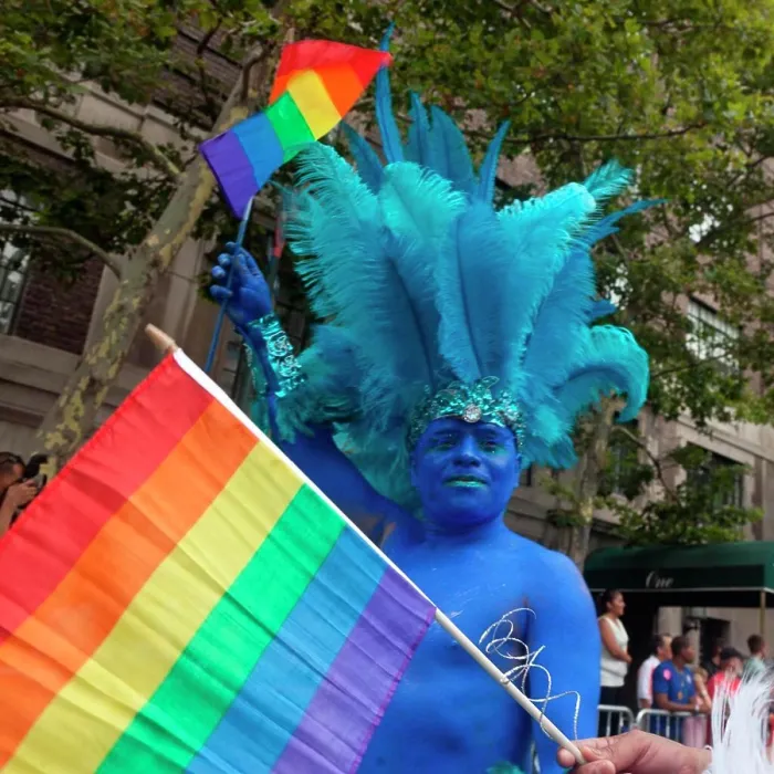 Framed Print : New York - United States, gay pride parade on fifth avenue, Portrait of a man who is painted blue Framed Print : New York - United States, gay pride parade on fifth avenue, Portrait of a man who is painted blue