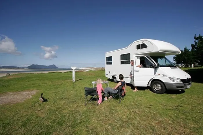 Framed Print : New Zealand, North Island, Northland, Ruakaka Wildlife Refuge, People sitting next to camper van Framed Print : New Zealand, North Island, Northland, Ruakaka Wildlife Refuge, People sitting next to camper van