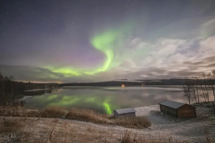 Framed Print : Northern lights in Tromso norway over wooden house Framed Print : Northern lights in Tromso norway over wooden house