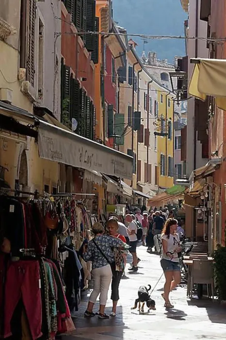 Framed Print : Old town alley with shops, tourists shopping, Garda, Lake Garda, Veneto, province of Verona, Italy, Europe Framed Print : Old town alley with shops, tourists shopping, Garda, Lake Garda, Veneto, province of Verona, Italy, Europe
