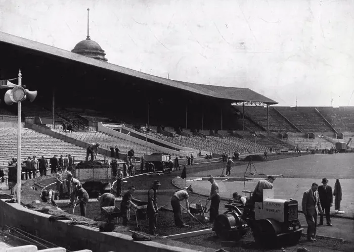 Framed Print : Olympic Change Over At Wembley Stadium : A busy scene at famous Wembley Stadium this morning