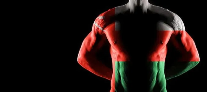 Framed Print : Oman flag on muscled male torso with abs, black background Framed Print : Oman flag on muscled male torso with abs, black background