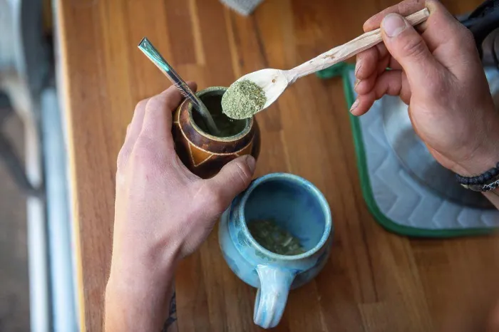 Framed Print : overhead shot of man making morning herbal tea Framed Print : overhead shot of man making morning herbal tea