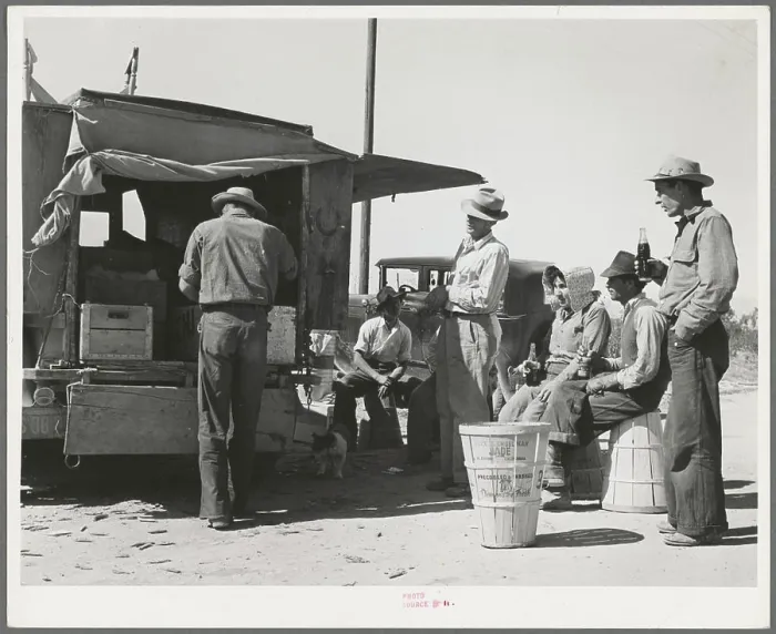 Framed Print : Pea pickers stop for a soft drink Framed Print : Pea pickers stop for a soft drink