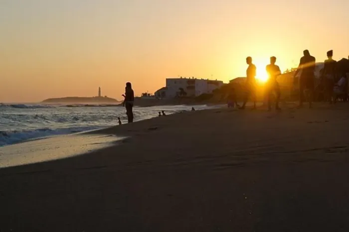 Framed Print : People on the beach at sunset, Cabo de Trafalgar in the background, Los Canos de Meca, Andalusia, Spain, Europe Framed Print : People on the beach at sunset, Cabo de Trafalgar in the background, Los Canos de Meca, Andalusia, Spain, Europe