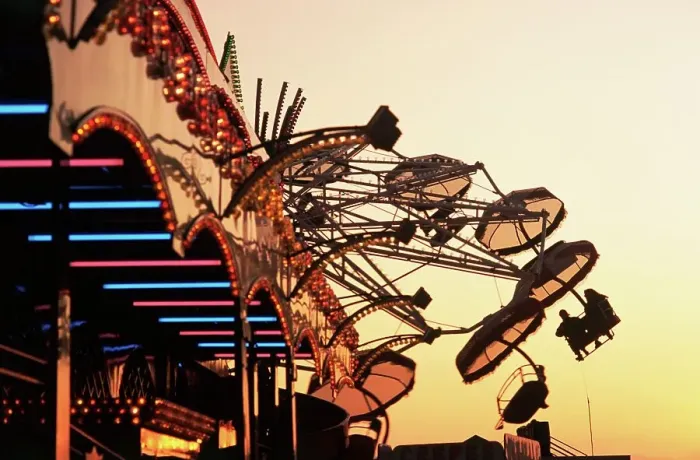 Framed Print : People riding a carnival way ride at sunset at the the Texas State Fair Framed Print : People riding a carnival way ride at sunset at the the Texas State Fair