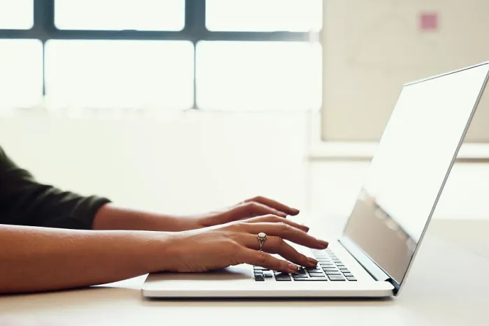 Framed Print : Person, hands and copywriting with laptop in closeup for news blog Framed Print : Person, hands and copywriting with laptop in closeup for news blog