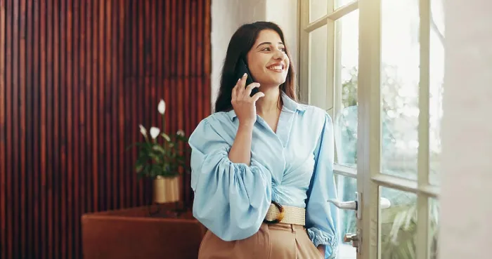 Framed Print : Phone call, window and business woman in office for communication