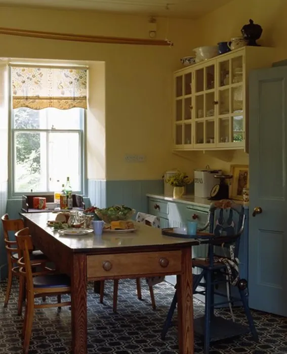 Framed Print : Pine table and chairs in cream and blue traditional kitchen with patterned flooring Framed Print : Pine table and chairs in cream and blue traditional kitchen with patterned flooring