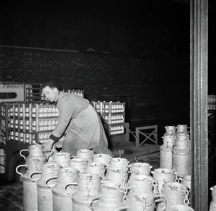 Framed Print : Poll photo collection. Report Paris. Milk factory: Man dragged the milk buses. 1950. France, Paris Framed Print : Poll photo collection. Report Paris. Milk factory: Man dragged the milk buses. 1950. France, Paris