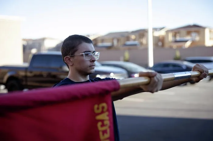Framed Print : A poolee with Recruiting Substation North Las Vegas holds out a guidon before conducting physical training at a pool Framed Print : A poolee with Recruiting Substation North Las Vegas holds out a guidon before conducting physical training at a pool