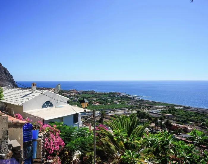 Framed Print : The port town of Valle Gran Rey on the Canary Island of Gomera in the midday sun Framed Print : The port town of Valle Gran Rey on the Canary Island of Gomera in the midday sun