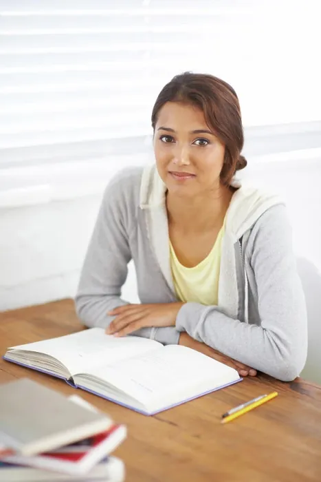 Framed Print : Portrait, book or woman at table in university Framed Print : Portrait, book or woman at table in university